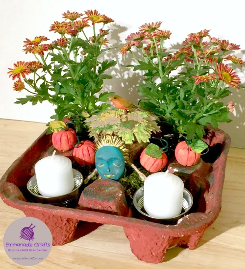 Learn how to upcycle a drink tray into an adorable centerpiece for fall!